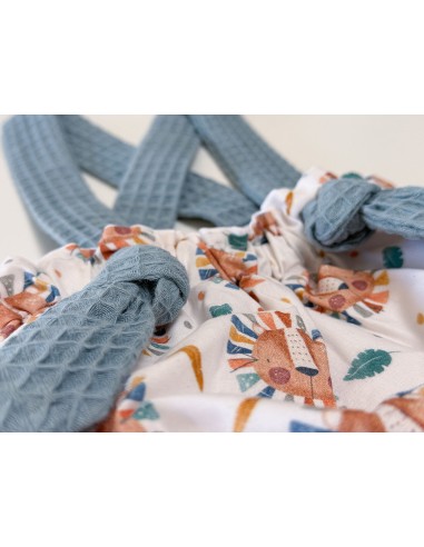 Cubrepañal con tirantes reversible