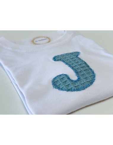 Cubrepañal con tirantes y camiseta