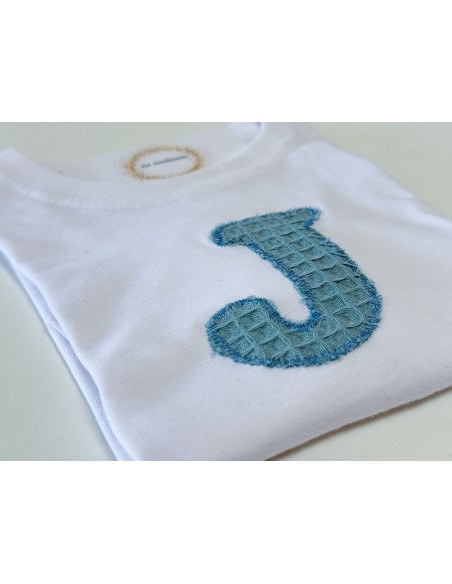 Cubrepañal con tirantes y camiseta